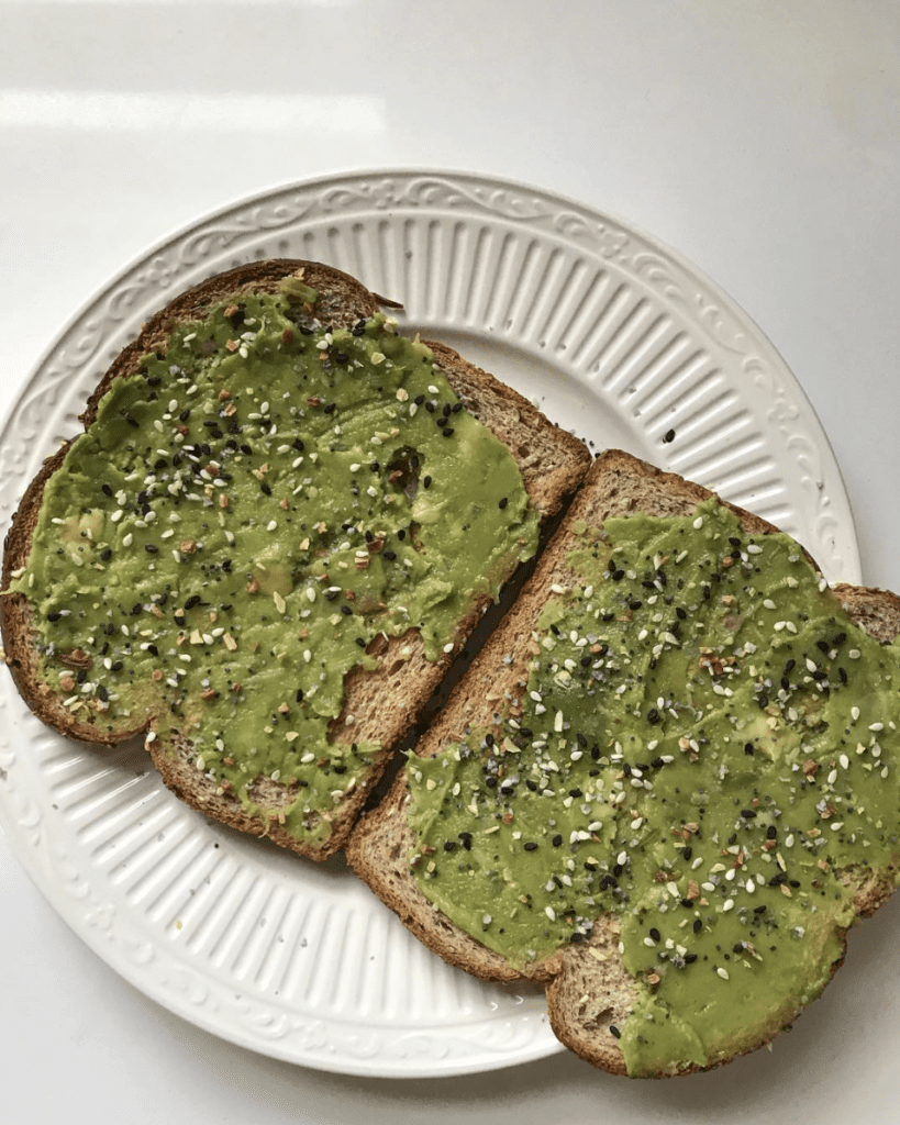 Easy breakfast ideas - toast with avocado spread and seasoning