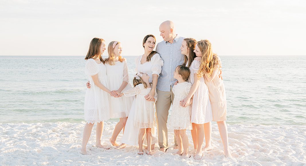 Photo of birmingham mom collective member Virginia Schultz and her family at the beach taken by Andrea Krey Photography