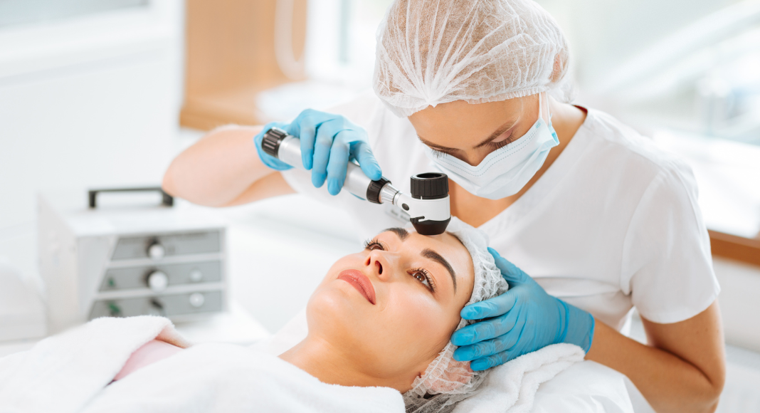 woman getting a skin cancer screening